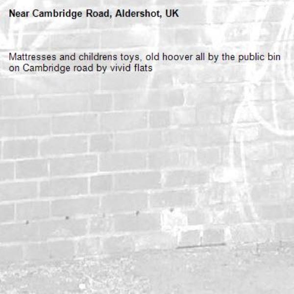 Mattresses and childrens toys, old hoover all by the public bin on Cambridge road by vivid flats-Cambridge Road, Aldershot, UK