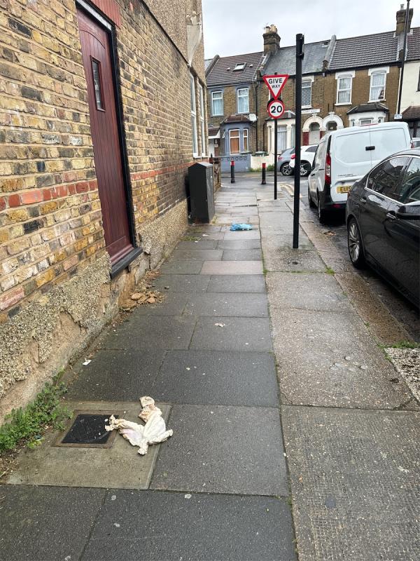 Discarded bag with used nappies on street. -182 Sutton Court Road, Plaistow, London, E13 9NS