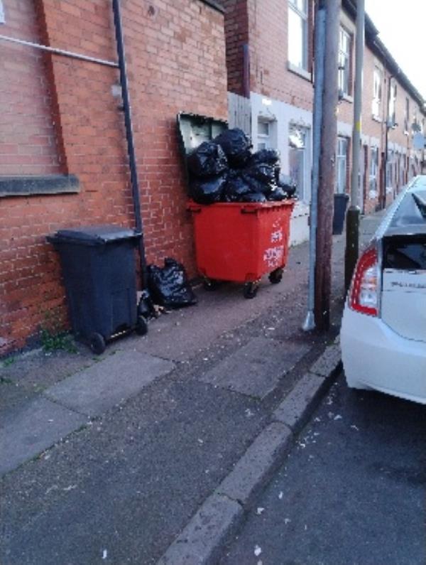 overflowing commercial bin at the top of Sawley street.-2 Sawley Street, Leicester, LE5 5JQ