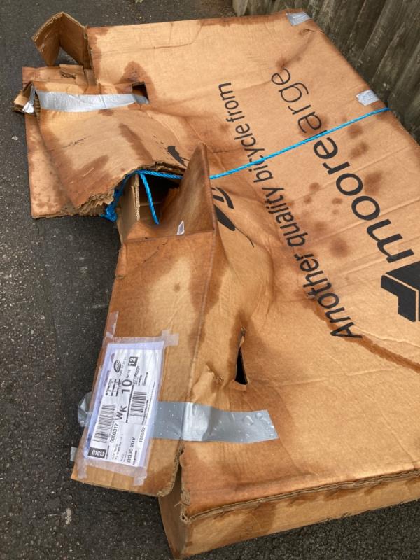 Carboard box and rope dumped on pavement -91 Belmont Road, Reading, RG30 2UT