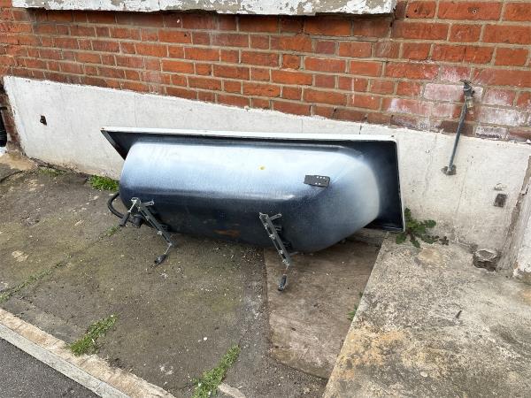 Discarded bath tub-54 Browning Road, Manor Park, London, E12 6QZ