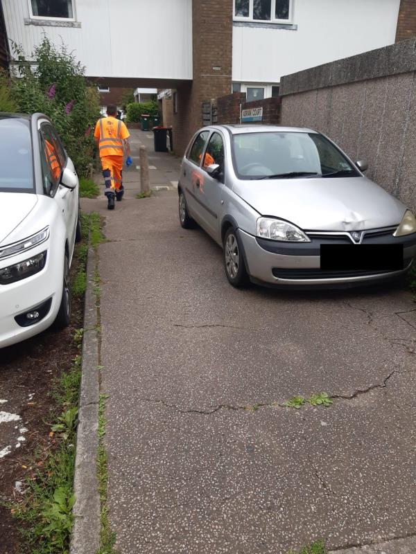 Silver Vauxhall Corsa (Y506 CRW) Parked on Pathway Restricting access to Adrian court for bin crews to make collections safely. Also restricted access for the public-Adrian Court Chadwick Close, Crawley, RH11 9LQ