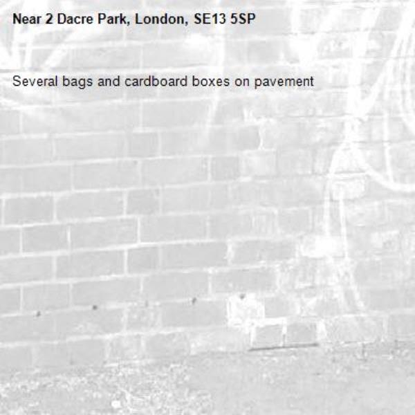 Several bags and cardboard boxes on pavement -2 Dacre Park, London, SE13 5SP