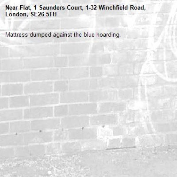Mattress dumped against the blue hoarding. -Flat, 1 Saunders Court, 1-32 Winchfield Road, London, SE26 5TH