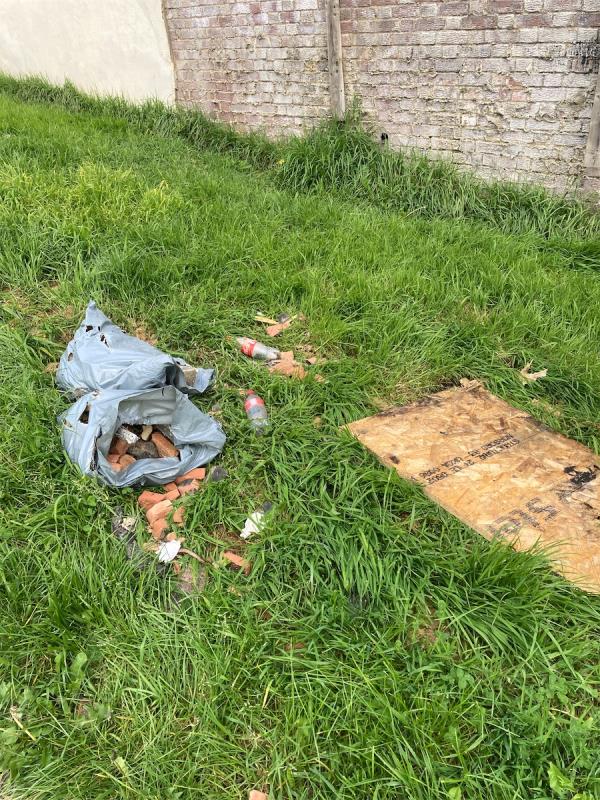 Builders waste fly tipped in Ladywell Fields-251 Manwood Road, London, SE4 1SF