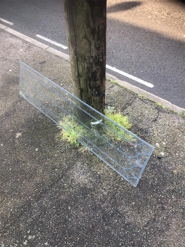 Please clear flytip glass panel-245 Brookehowse Road, Bellingham, London, SE6 3TT