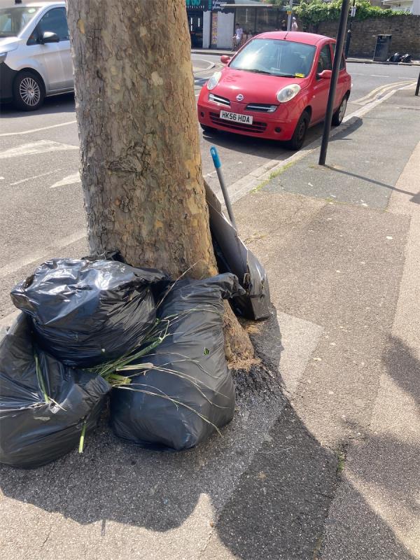 Rubbish bags , timber, broom stick-26 Wilson Road, East Ham, London, E6 3EF