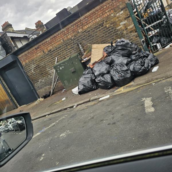 Bin bags blocking footpath, leaking and causing a stench.-3 Heigham Road, East Ham, London, E6 2JL