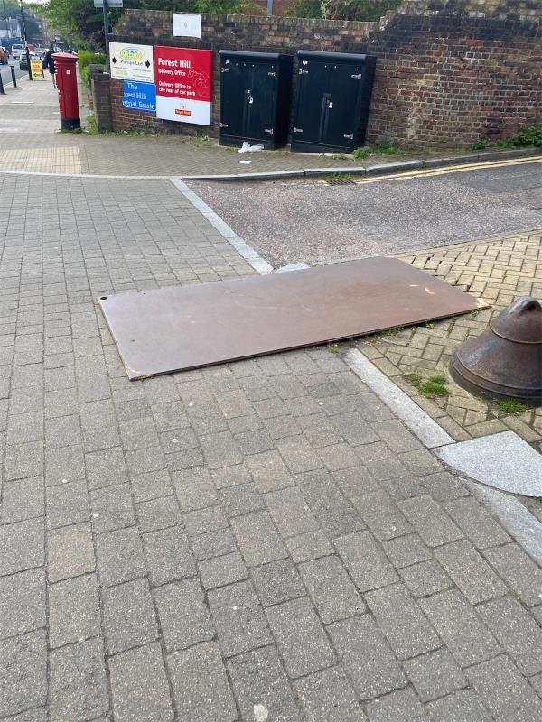 Large metal sign on floor causing serious tripping hazard and environmental eyesore -Unit 4, Forest Hill Industrial Estate, Perry Vale, Forest Hill, London, SE23 2LX