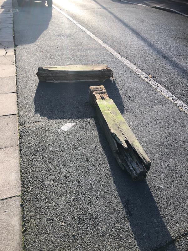 Outside no 1 Shaw Path. Please clear two dumped wooden bollards-180 Shroffold Road, Bromley, BR1 5NJ