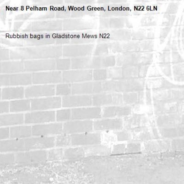 Rubbish bags in Gladstone Mews N22-8 Pelham Road, Wood Green, London, N22 6LN
