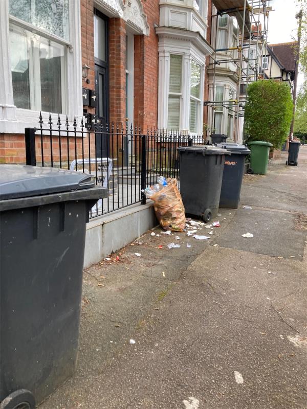 Residents of 8 Sandown Road repeatedly put bins and recycling out too late for collection. Rubbish is often in bags which are then opened by vermin and foxes. Currently burst bag of rubbish again over the pavement alongside discarded cigarette ends on the pavement from one of the residents who smokes outside the property -Sandown Road, Leicester
