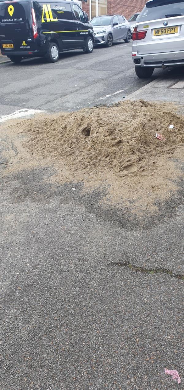 Someone has dumped a whole load of what looks like builders sand on lamsbcroft avenge -12 Lambscroft Avenue, Grove Park, London, SE9 4NZ