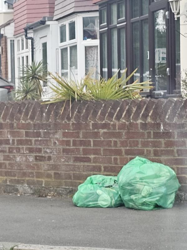 Green bags on pavement for 5 days-222 Park Avenue, Southall, UB1 3AN