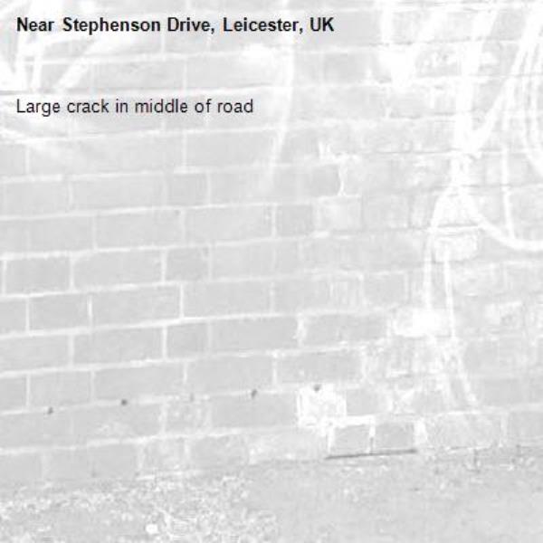 Large crack in middle of road-Stephenson Drive, Leicester, UK