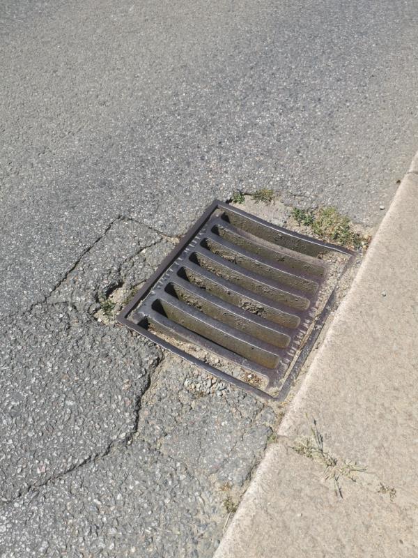 One road drain which has sunk approx 3 inches below road level is cracking up the tarmac and is now dangerous for cyclists. The other is an inspection cover which has broken the tarmac and exposed the stones underneath as there is a hole approx size 5x4 inches, 4 inches deep, another danger to cyclists and car tyres. -11 La Route de Beaumont, Jersey JE3, Jersey