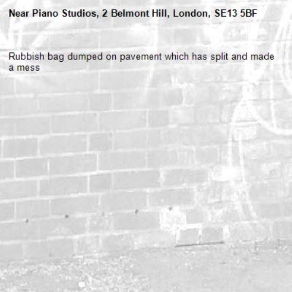 Rubbish bag dumped on pavement which has split and made a mess
-Piano Studios, 2 Belmont Hill, London, SE13 5BF