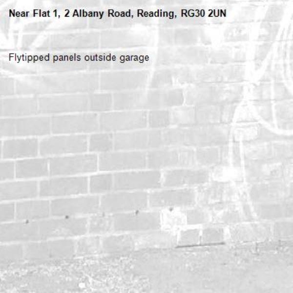 Flytipped panels outside garage -Flat 1, 2 Albany Road, Reading, RG30 2UN