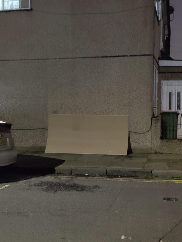 Some one has fly tipped a sheet of wood or plaster board -25b Westbury Road, Green Street West, E7 8BU, England, United Kingdom