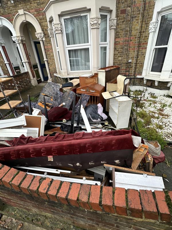 People have offloaded the contents of their house in my 82 year old mothers front yard please see photos-247 Hither Green Lane SE13 6TH