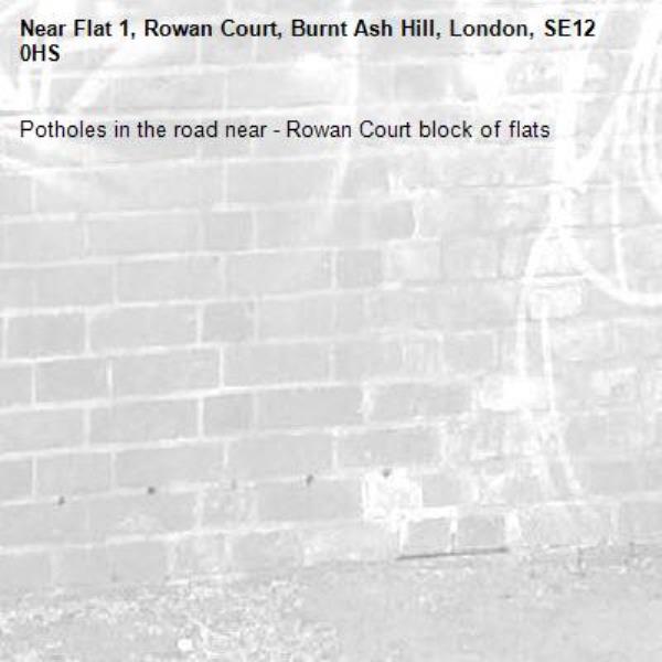 Potholes in the road near - Rowan Court block of flats-Flat 1, Rowan Court, Burnt Ash Hill, London, SE12 0HS