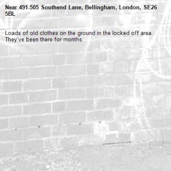 Loads of old clothes on the ground in the locked off area. They&#39;ve been there for months. -491-505 Southend Lane, Bellingham, London, SE26 5BL