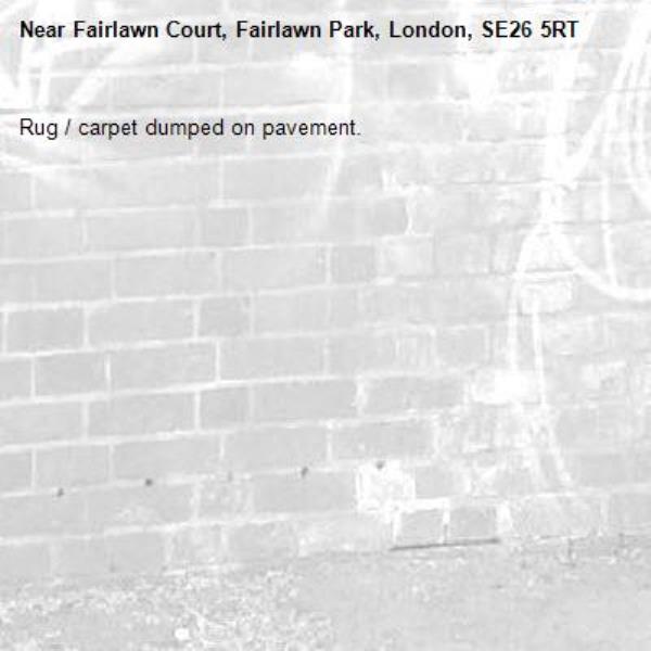 Rug / carpet dumped on pavement. -Fairlawn Court, Fairlawn Park, London, SE26 5RT