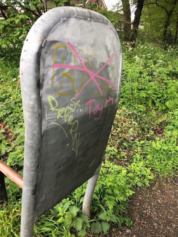 By the Links Doctors. Remove graffiti from cycle barriers at entrance to Mottingham Woods-187 Court Farm Road, Mottingham, London, SE9 4JS