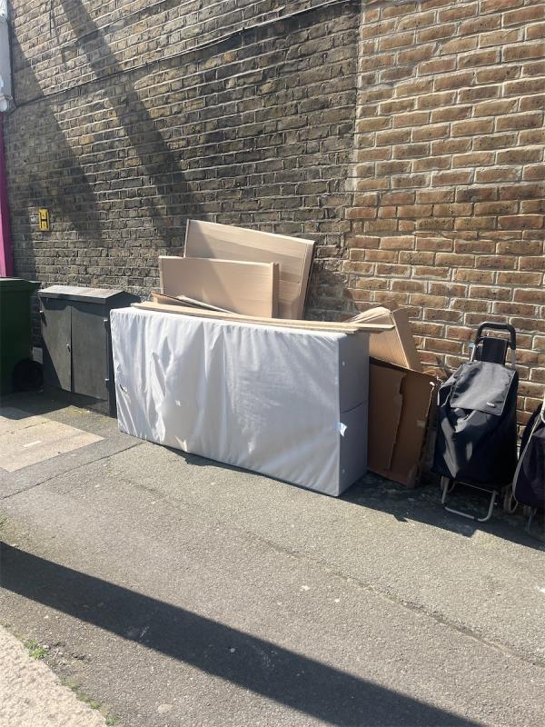 Rubbish such as a bed base dumped-64 Tennyson Road, Stratford, London, E15 4DH