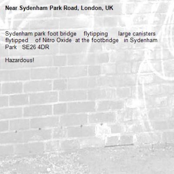 Sydenham park foot bridge    flytipping      large canisters flytipped    of Nitro Oxide  at the footbridge   in Sydenham Park   SE26 4DR

Hazardous!-Sydenham Park Road, London, UK