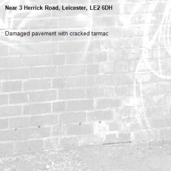 Damaged pavement with cracked tarmac-3 Herrick Road, Leicester, LE2 6DH