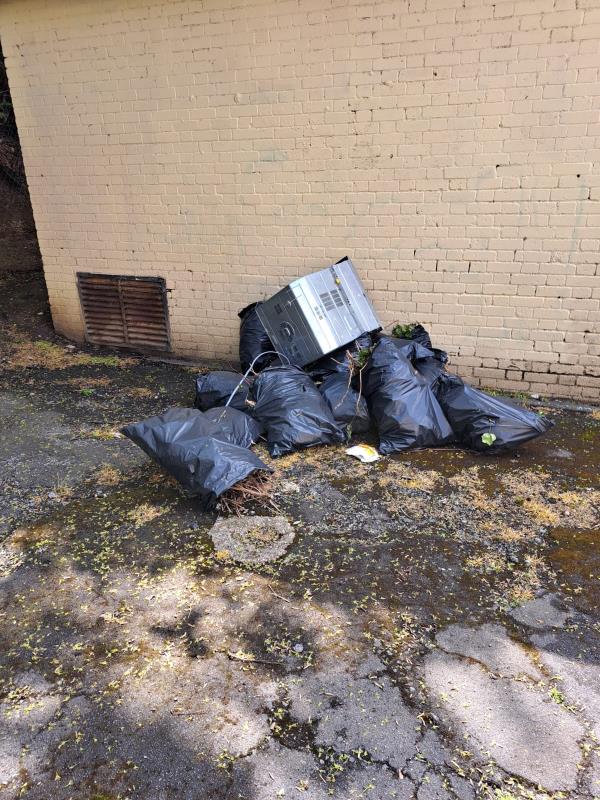 Bags with builders waste left by the substation-Viney Road Substation