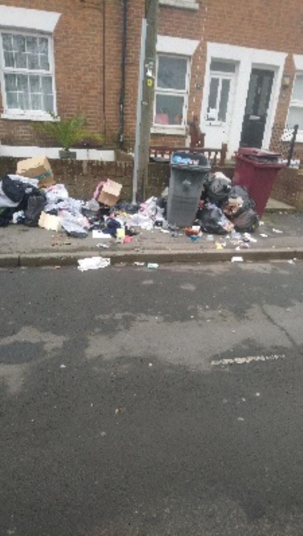 Domestic waste needs investigating, strewn along footpath Howard Street. -30a Howard Street, Reading, RG1 7XS