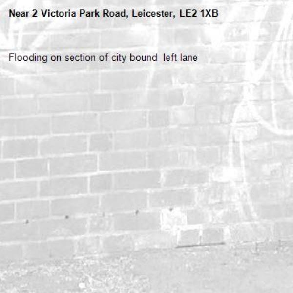 Flooding on section of city bound  left lane -2 Victoria Park Road, Leicester, LE2 1XB