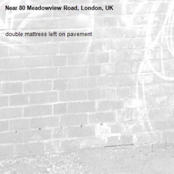 double mattress left on pavement -80 Meadowview Road, London, UK