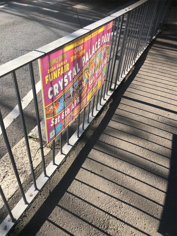 Outside Mayow Park. Remove flypostering from railings -73B, Mayow Road, London, SE26 4AA