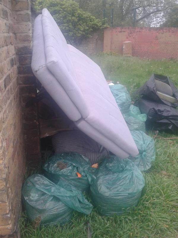 Opposite Development Site. Please clear flytip from grass area-Saunders Court, 1-32 Winchfield Road, London, SE26 5TH