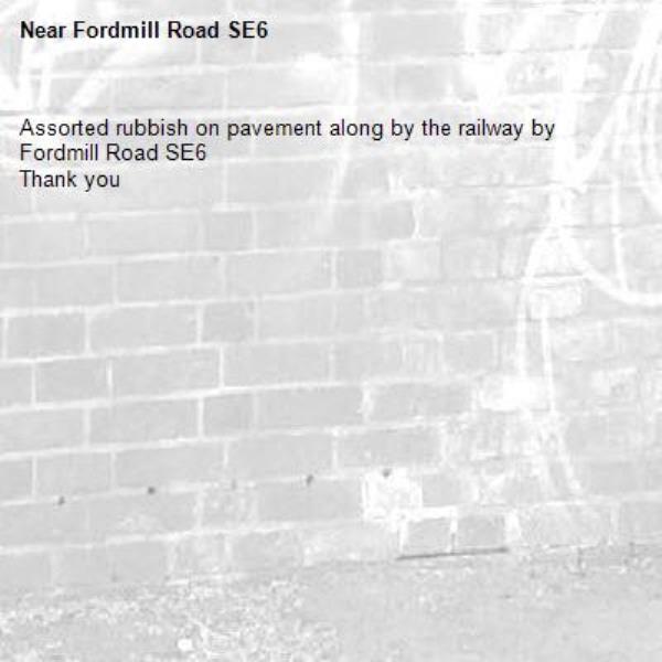 Assorted rubbish on pavement along by the railway by Fordmill Road SE6 
Thank you -Fordmill Road SE6 