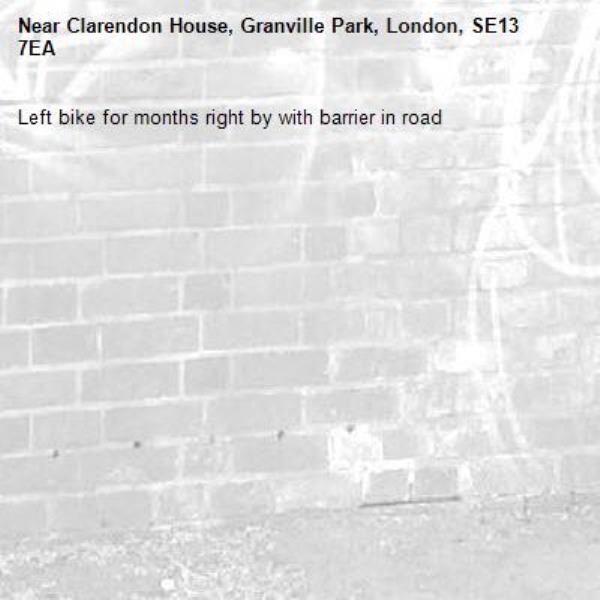 Left bike for months right by with barrier in road -Clarendon House, Granville Park, London, SE13 7EA