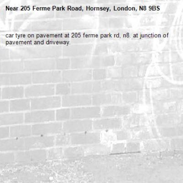 car tyre on pavement at 205 ferme park rd, n8. at junction of pavement and driveway.-205 Ferme Park Road, Hornsey, London, N8 9BS