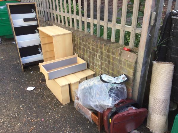 2 x chest of draws, suitcase x 3 bags carpets boxes and clothes behind bins-25 Holland Road, London, E15 3BP