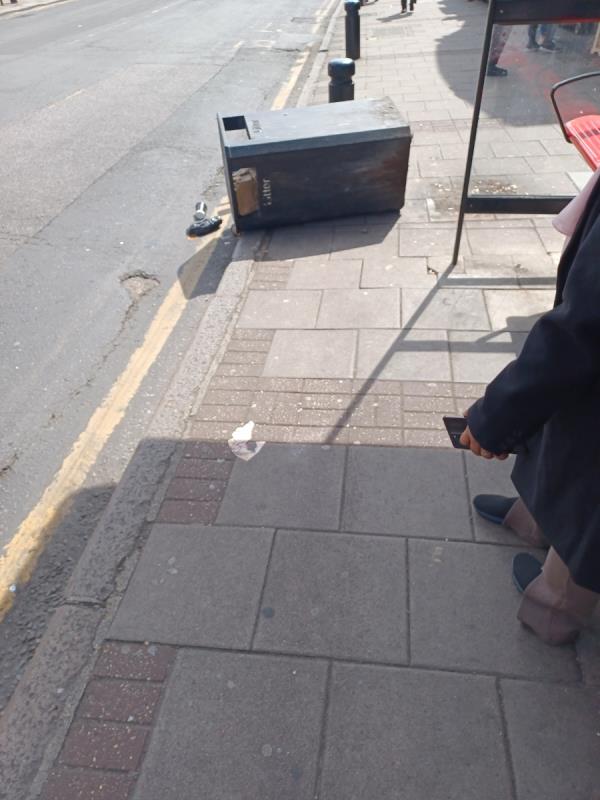 Bins been knocked over nearly in road-E12 Medical Centre, 243 High Street North, Manor Park, London, E12 6SJ