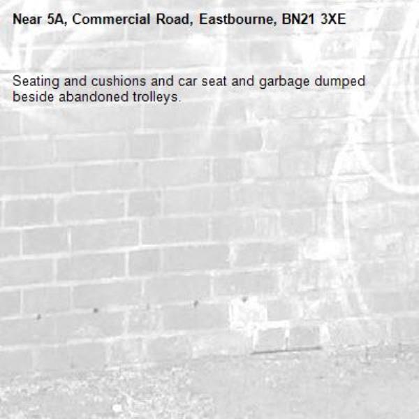 Seating and cushions and car seat and garbage dumped beside abandoned trolleys.-5A, Commercial Road, Eastbourne, BN21 3XE