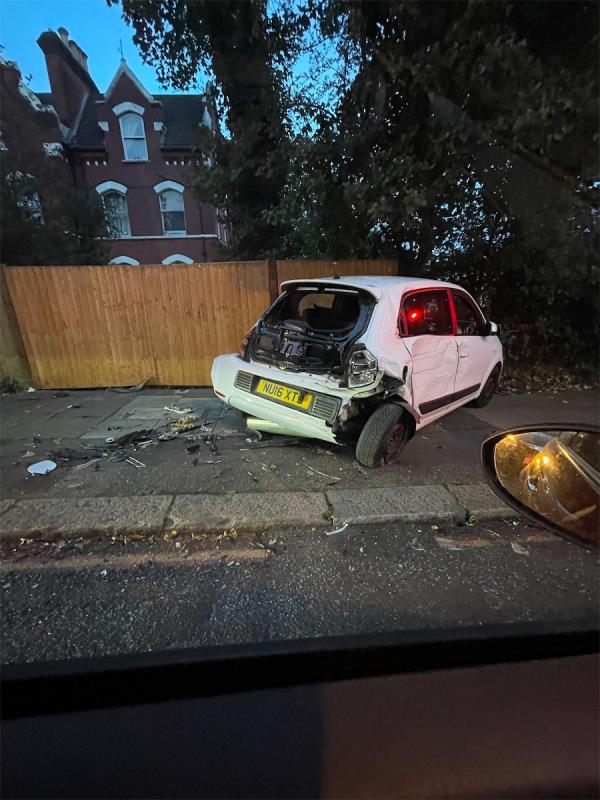 Crashed car sitting across pavement for more than a week now. -203A, Honor Oak Road, London, SE23 3RP
