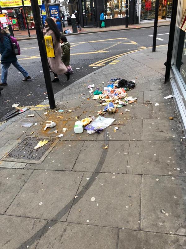 Rubbish on the walking pavement near the pole blocking the walking space. All the rubbish bags derive from the flats above the shops in the corners of Plashet Road going into Green Street. -Unit 4 306-308, Plashet Road, E13 9AP 