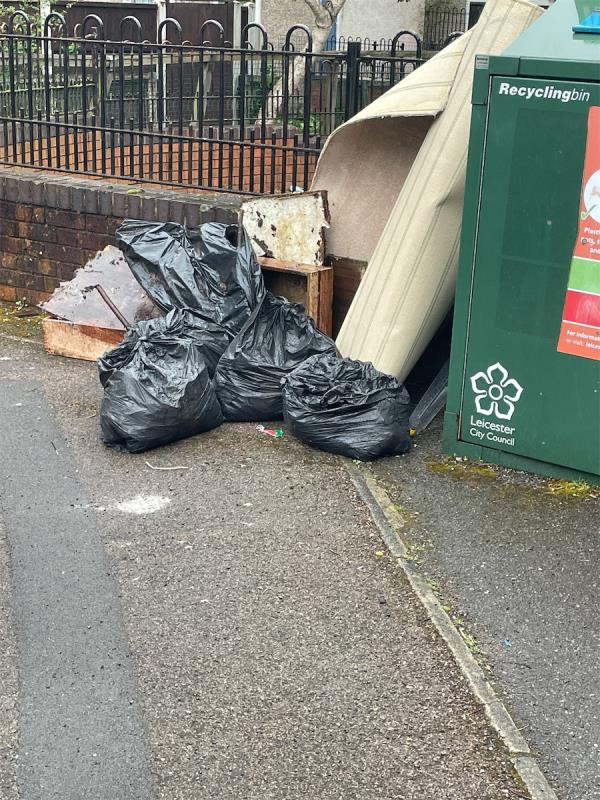 Big carpet and 5/6 black bags with household rubbish -21 Pegasus Close, Leicester, LE2 0UJ
