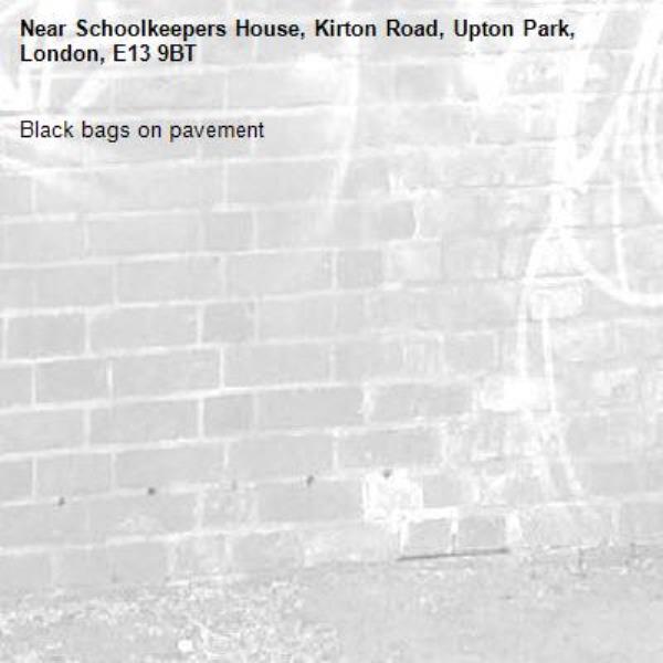 Black bags on pavement-Schoolkeepers House, Kirton Road, Upton Park, London, E13 9BT