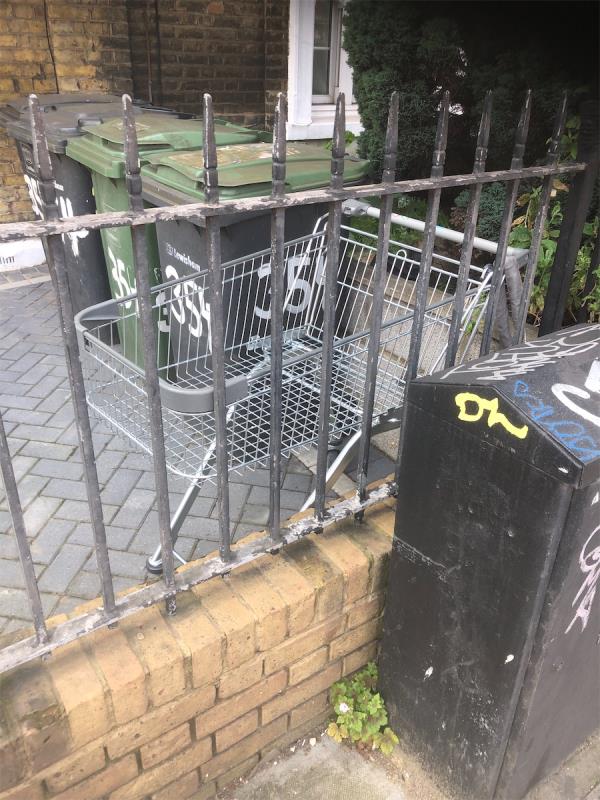 Please clear a Lidl Trolley from front garden-354 New Cross Road, London, SE14 6AG
