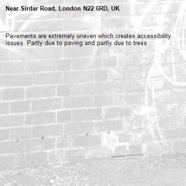 Pavements are extremely uneven which creates accessibility issues. Partly due to paving and partly due to trees-Sirdar Road, London N22 6RD, UK
