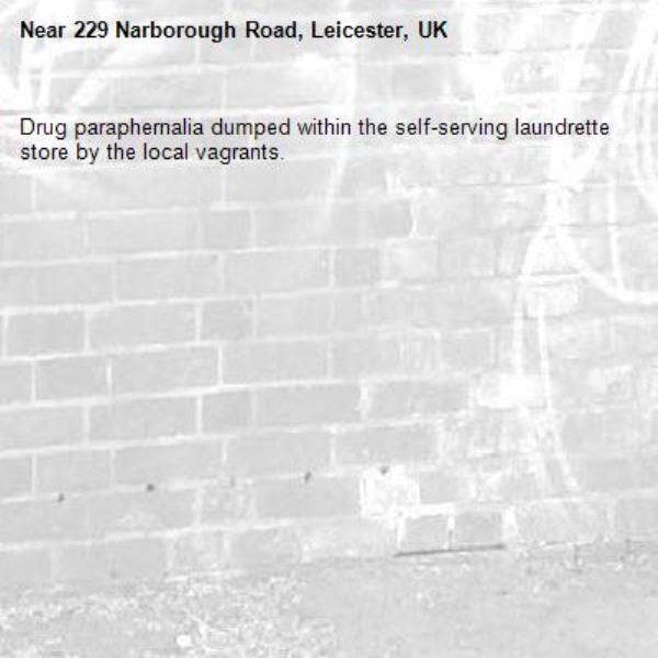 Drug paraphernalia dumped within the self-serving laundrette store by the local vagrants.-229 Narborough Road, Leicester, UK